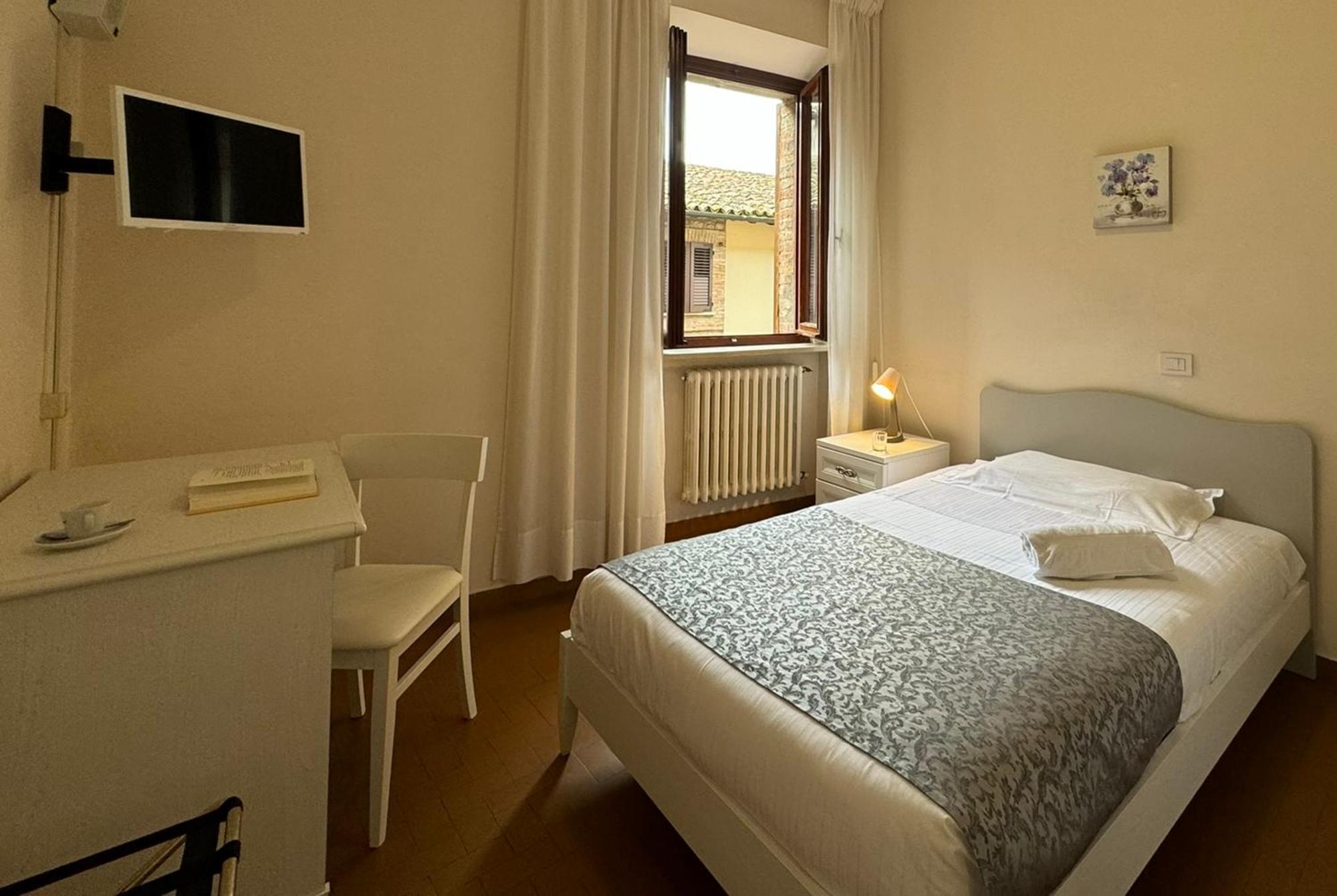 Monastero Ss. Annunziata Otel Todi Dış mekan fotoğraf A room at the hotel