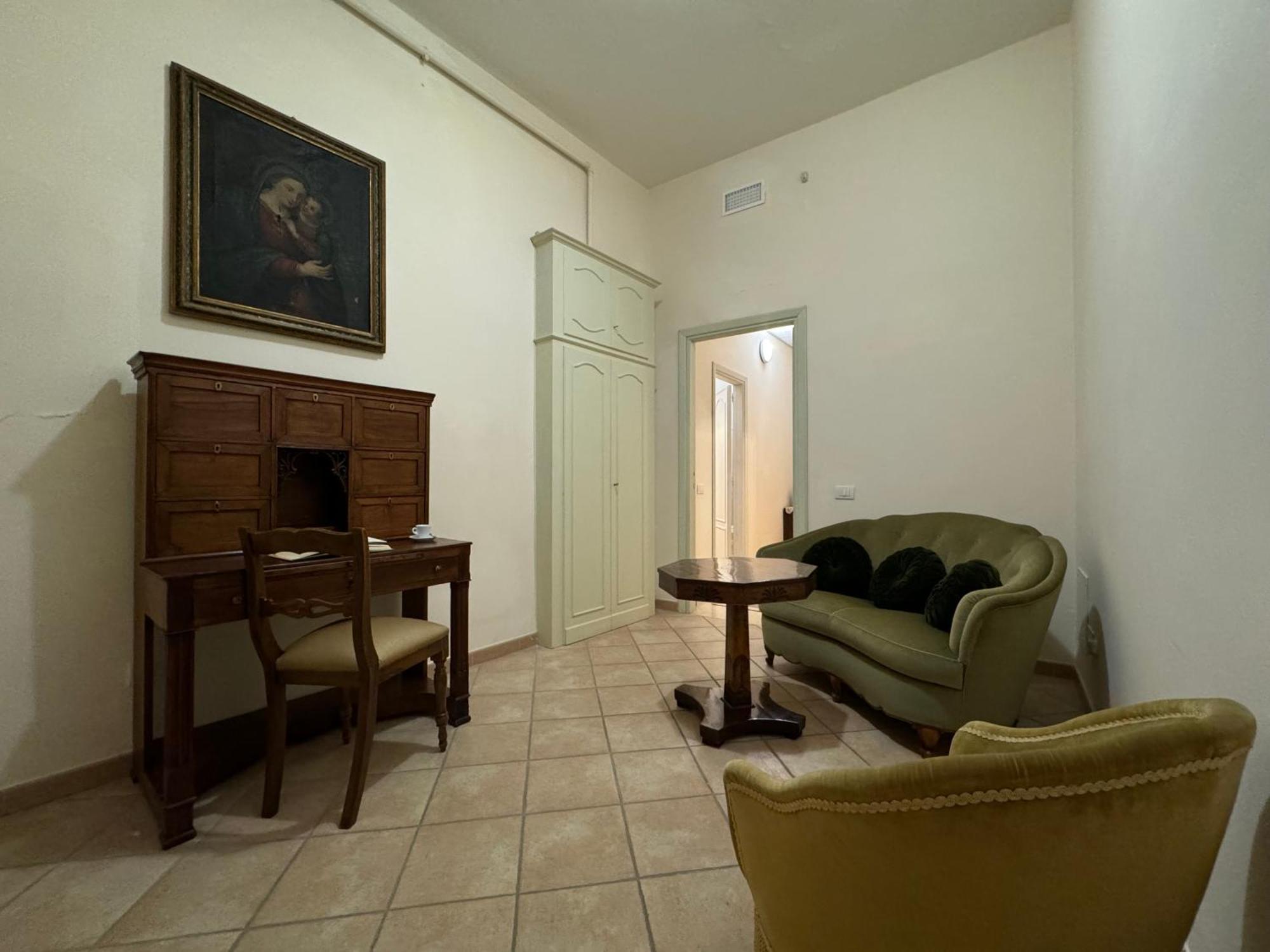 Monastero Ss. Annunziata Otel Todi Dış mekan fotoğraf The living room of the apartment